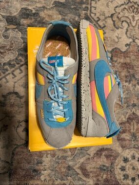 Nike Gray Sneakers with Blue, Pink & Yellow Stripes